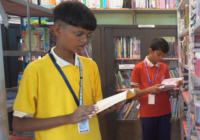 Students reading in the school library